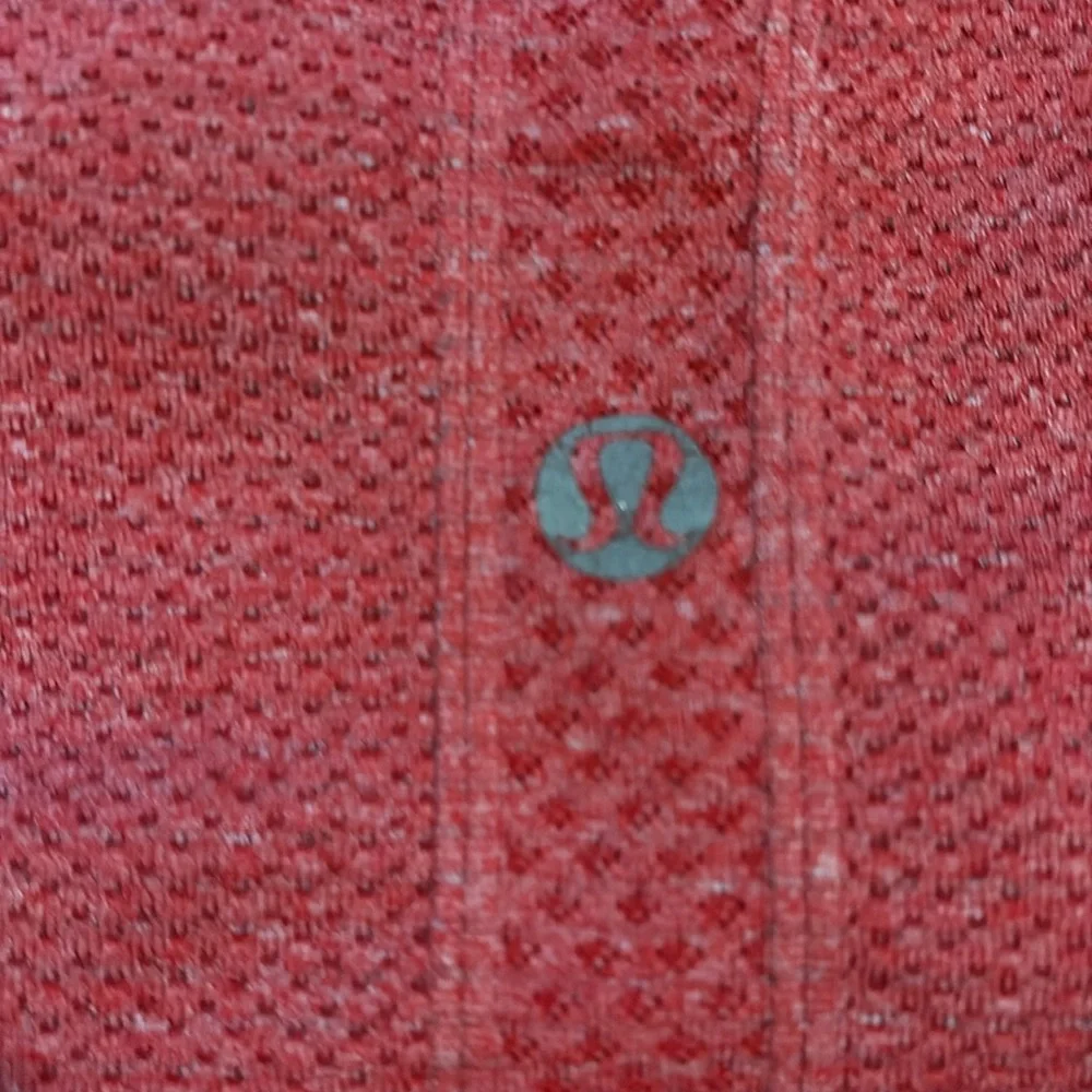 Lululemon short sleeve tech shirt, hip length. size 4